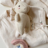 Enchanting Melodies Unicorn Toy, Musical Activity Toy for Little Hands, Rainbow Grasp Design  Konges Sløjd   